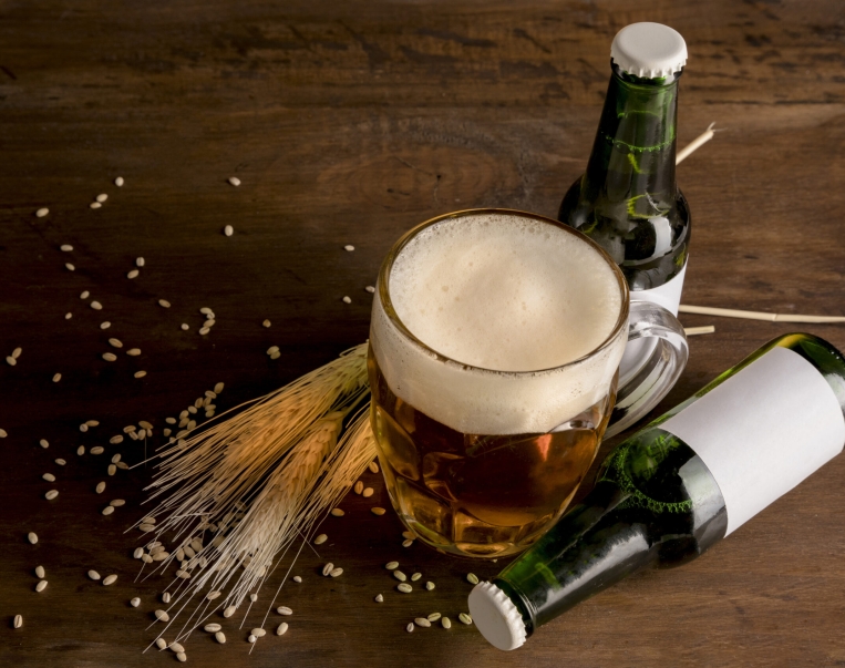 green-bottles-beer-with-glass-beer-wooden-table